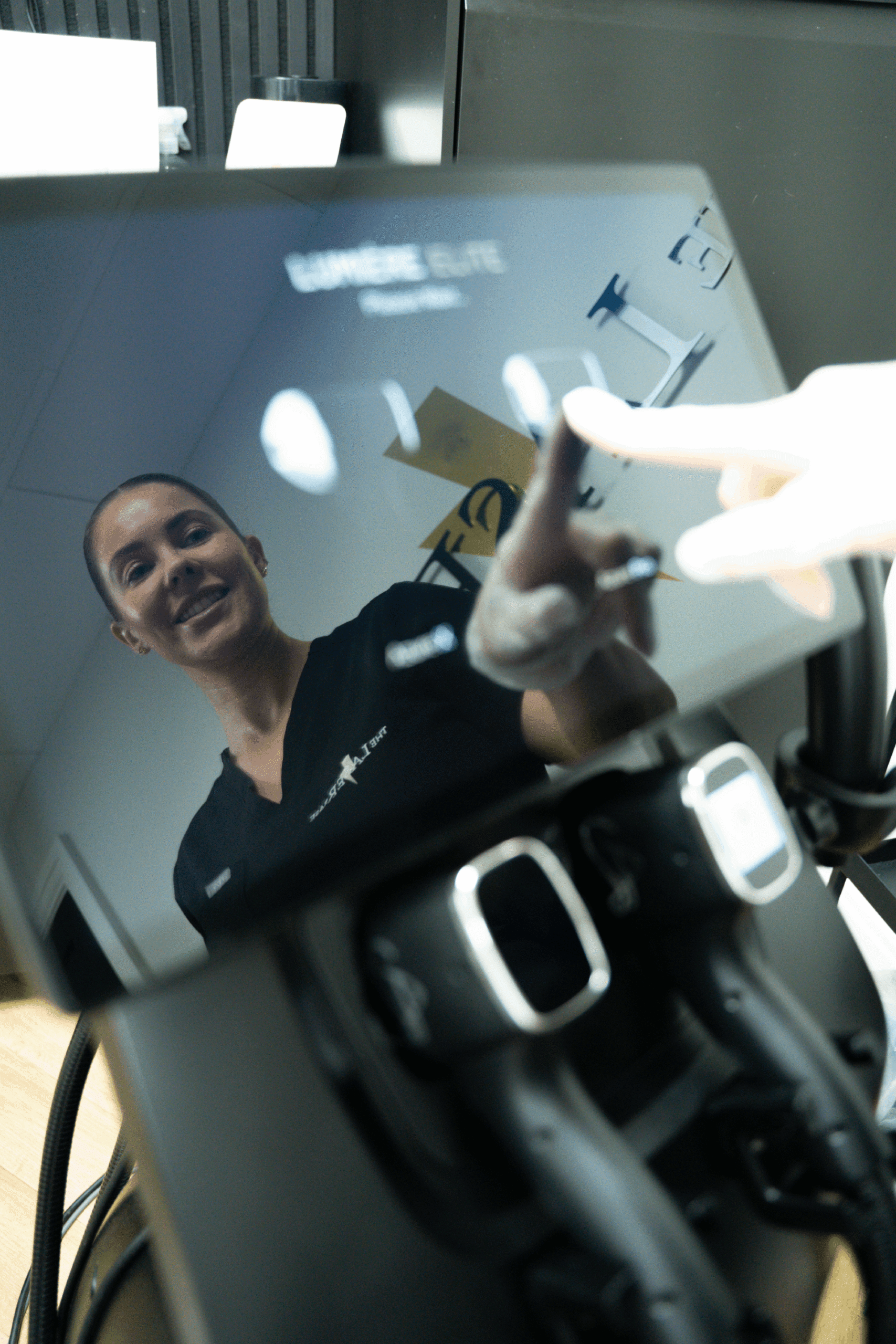 Laser technician using the Lumière Elite device
