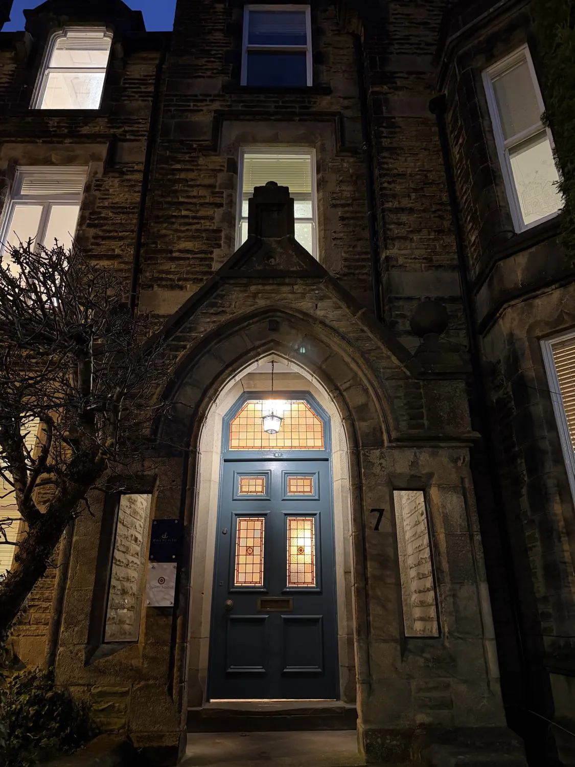 The entrance to The Laser Base clinic on Victoria Avenue, Harrogate, lit up at night